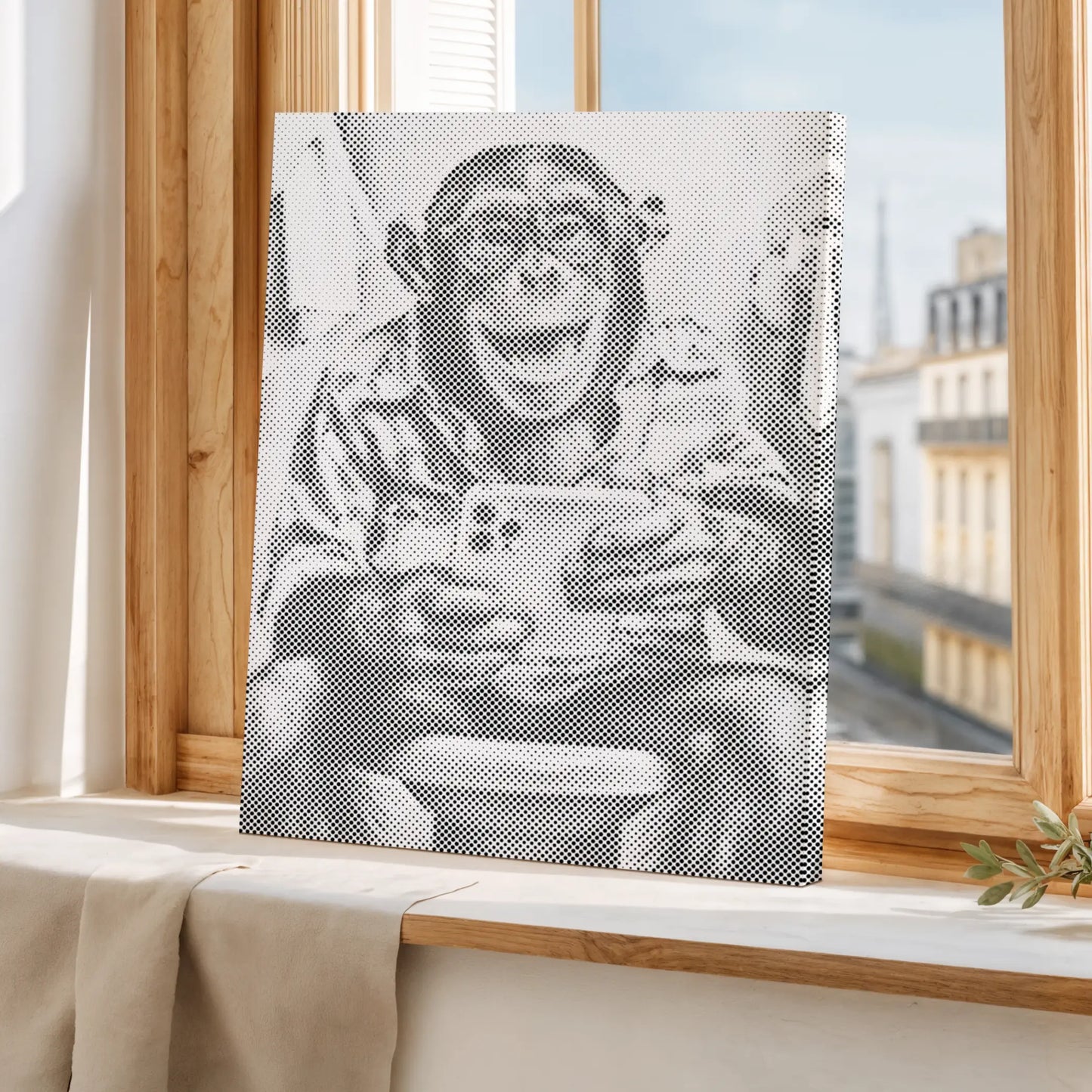 Framed artwork of a monkey holding a coffee cup on a windowsill with a cityscape view.