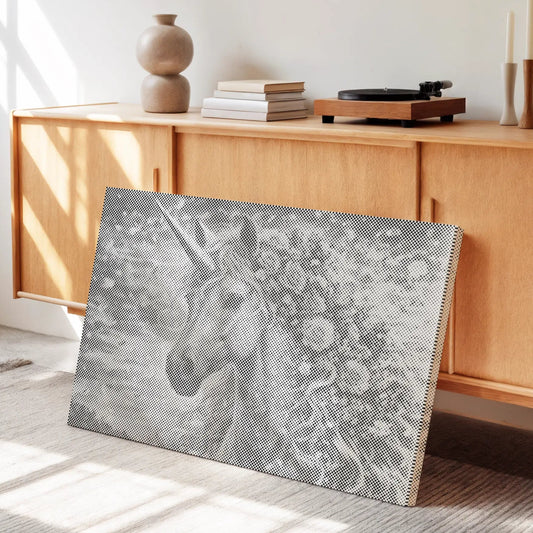 Decorative wall art with a horse design on a textured surface in a room with wooden furniture and sunlight.