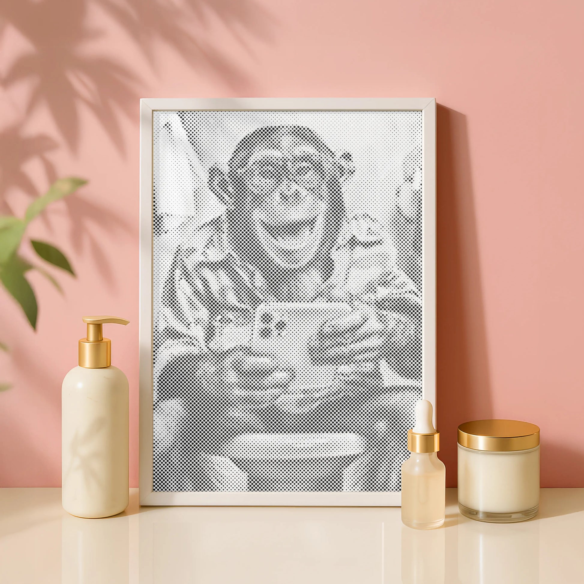 Framed artwork of a monkey holding a smartphone on a pink wall with decorative items.
