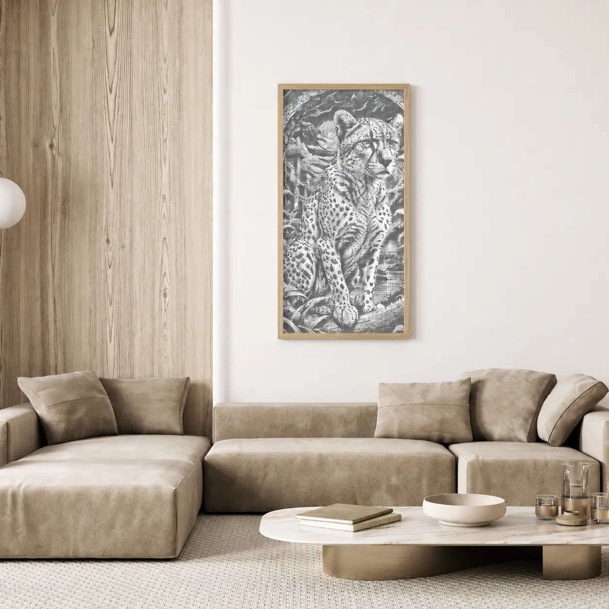Beige sectional sofa in a living room with a cheetah print painting on the wall. Majestic Leopard | Dot Painting Kit