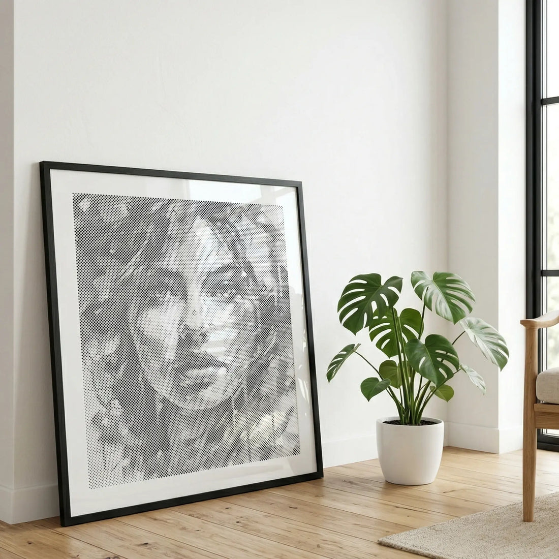 A finished dot painting displayed as wall art in a calm interior