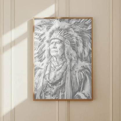 Framed artwork of a person wearing a headdress on a beige wall.