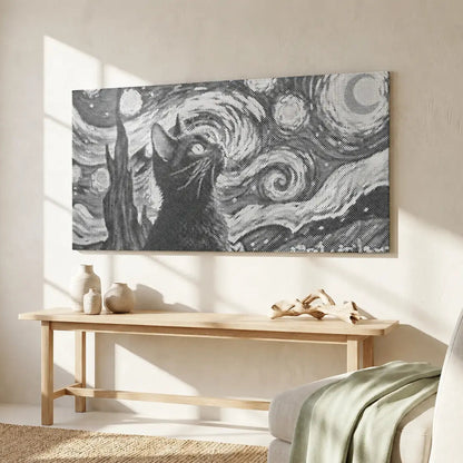 Framed artwork resembling 'Starry Night' with a cat's face on a wall in a room with a table and chair.