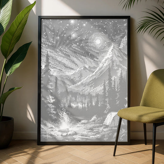 Framed artwork on a wall with a green chair and plant in a room. Dot painting 