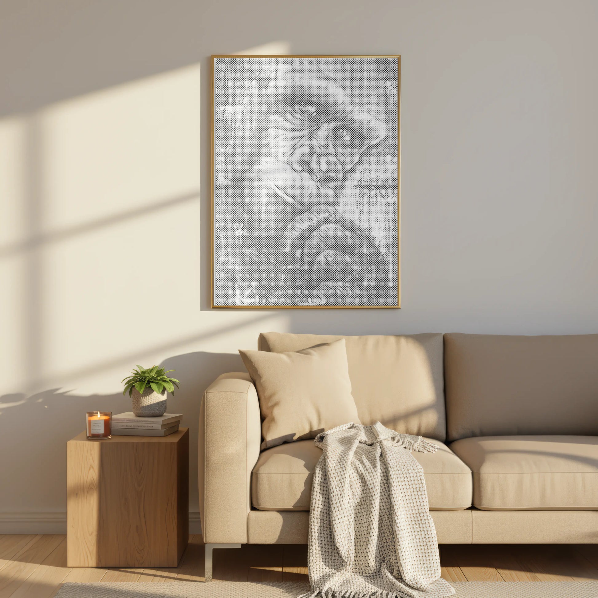 Framed artwork of a gorilla's face on a wall above a beige sofa in a living room. The Thinking Gorilla | Dot Painting Kit