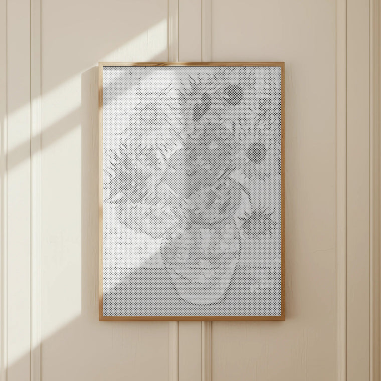 Framed abstract artwork on a beige wall. sunflowers van gogh dot painting 