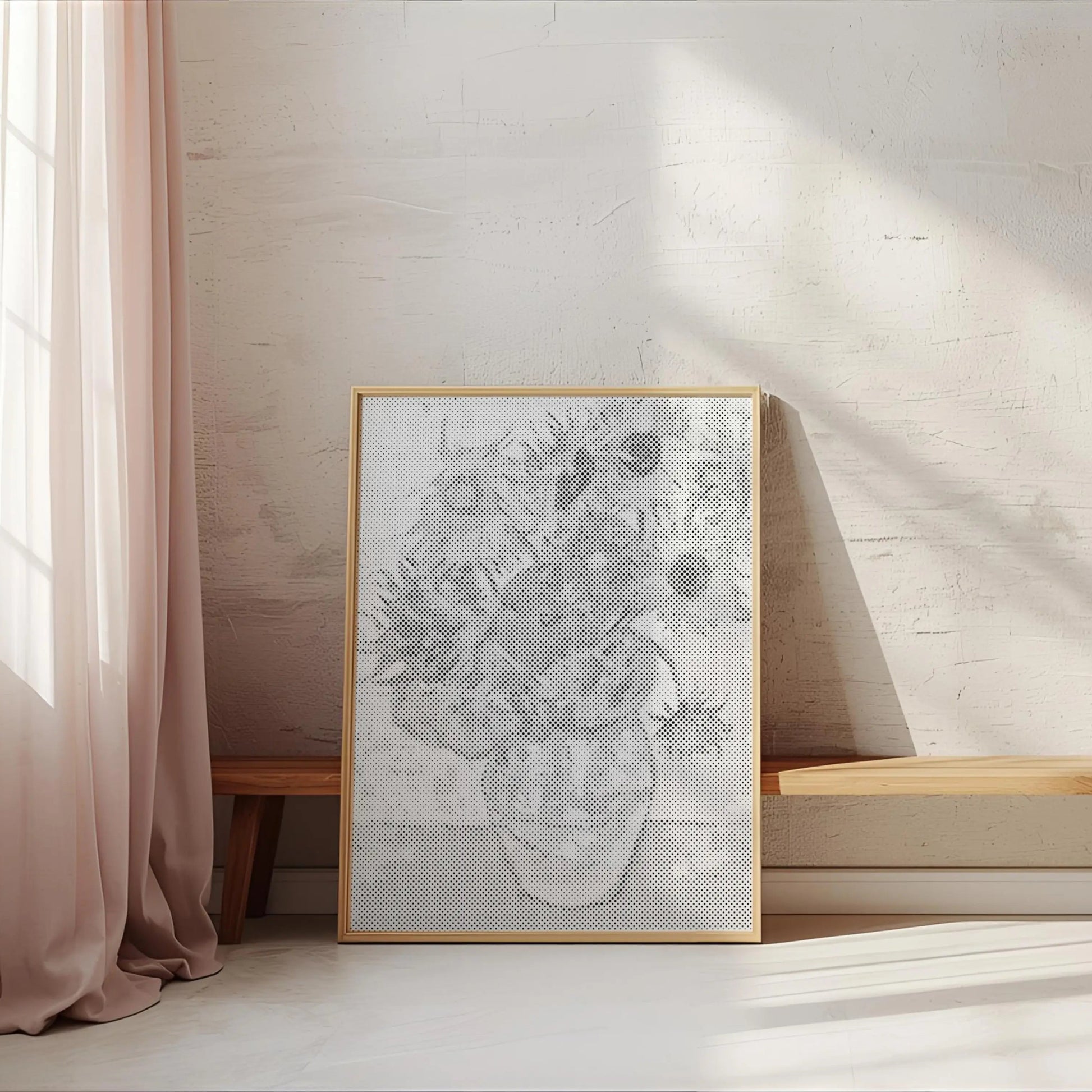 Framed artwork on a wall next to a window with pink curtains 